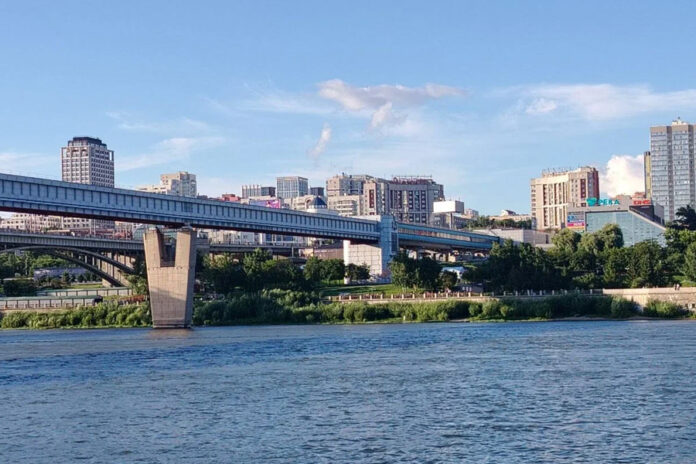 город